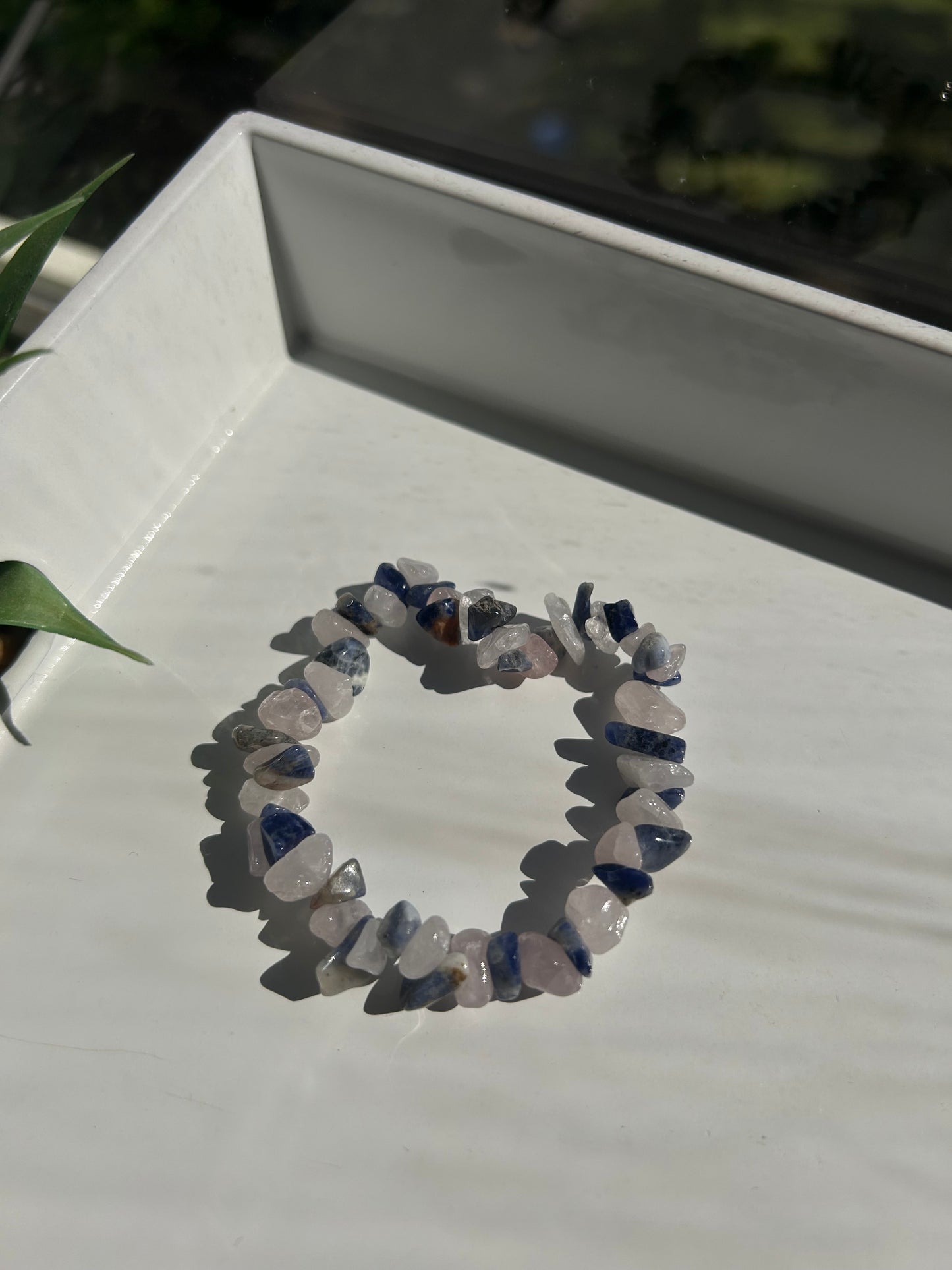 Bracelet with natural stones on a white surface