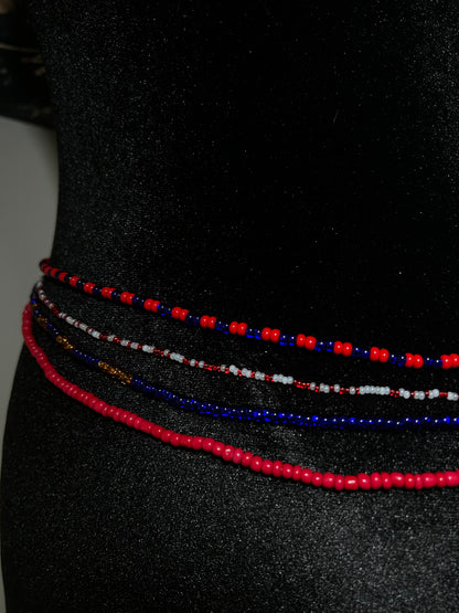 Three beaded necklaces in red, blue, and white on a black background
