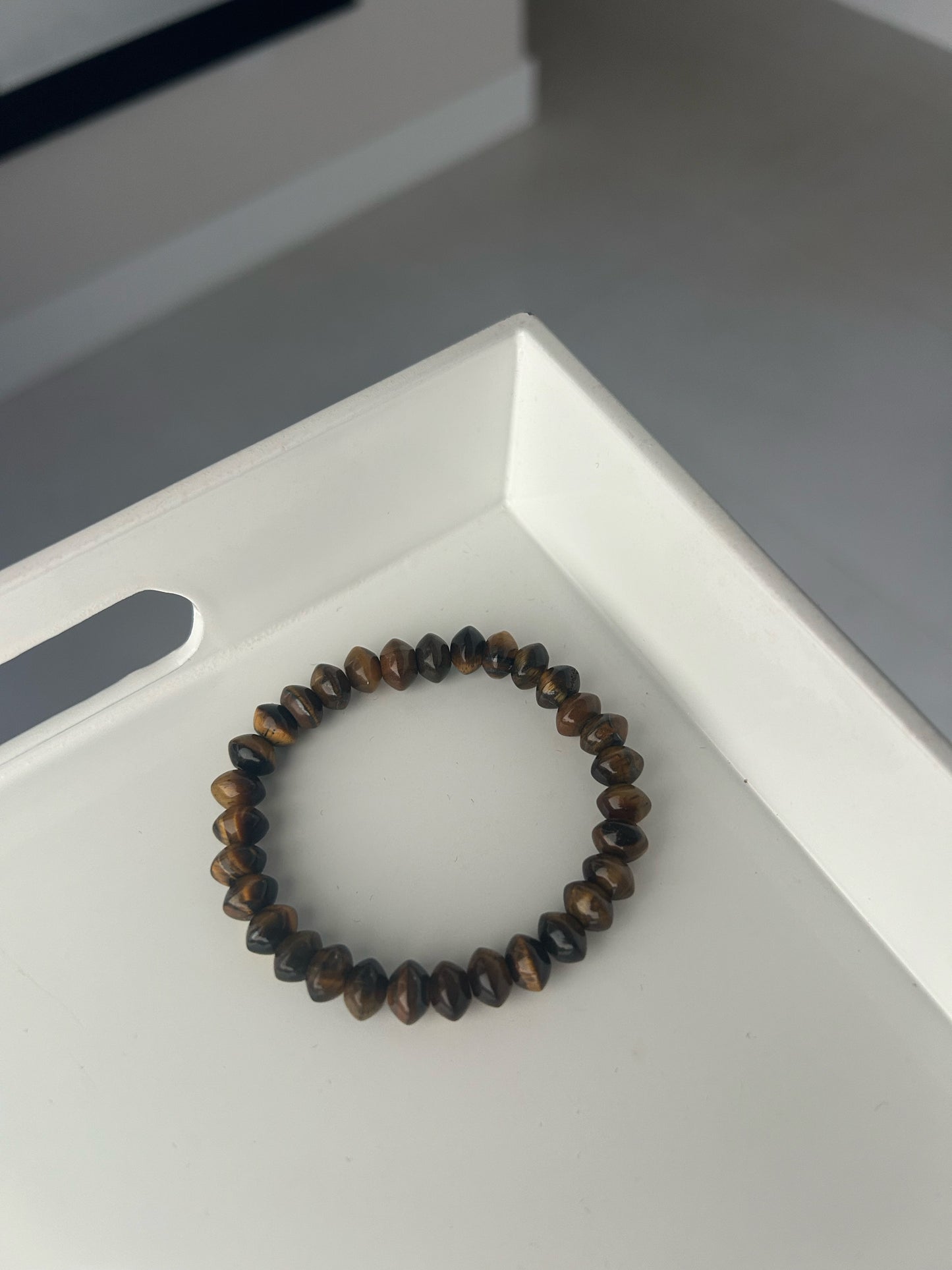 Tigers eye  beaded bracelet on a white surface