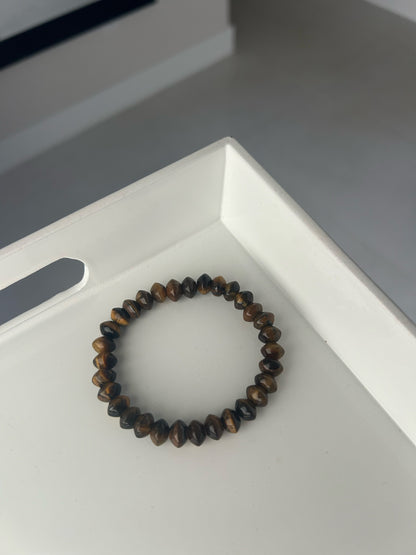 Tigers eye  beaded bracelet on a white surface