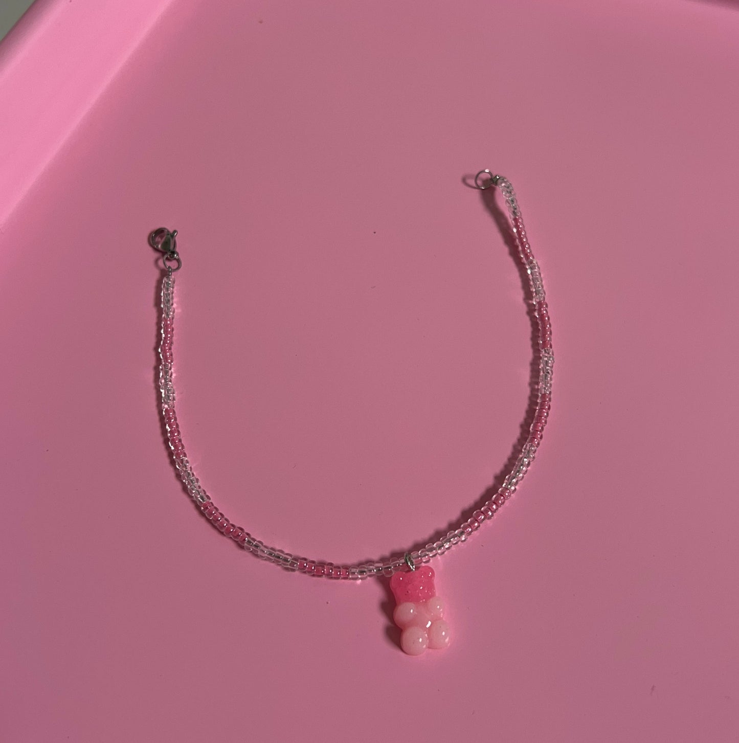 Pink beaded bracelet with gummy bear 