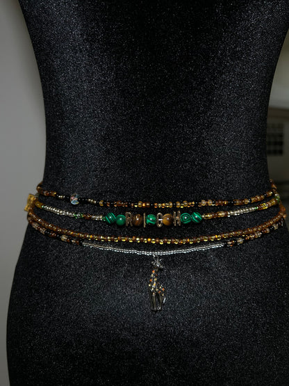 Set of beaded bracelets on a black mannequin waist 