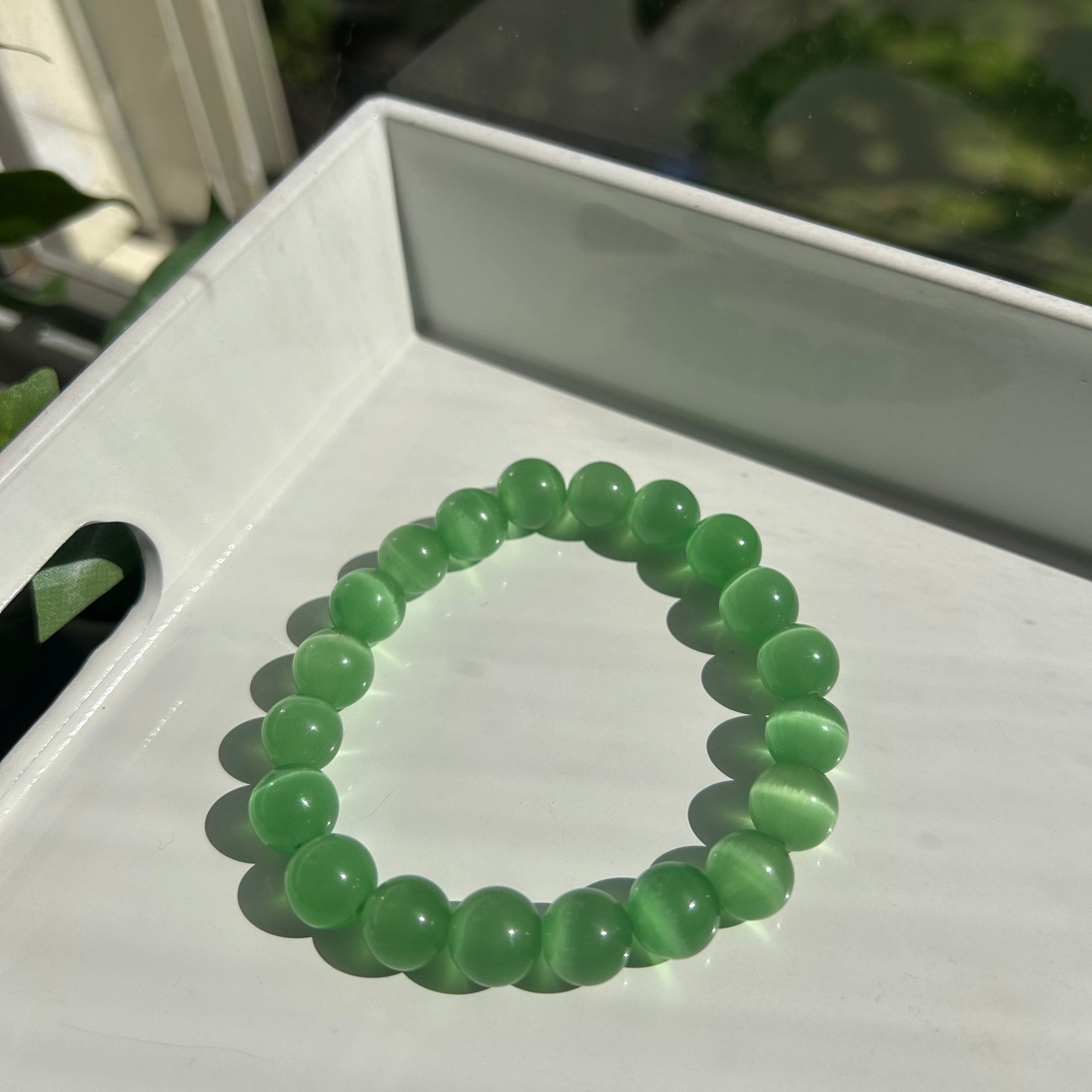 Green round cat eye bead bracelet