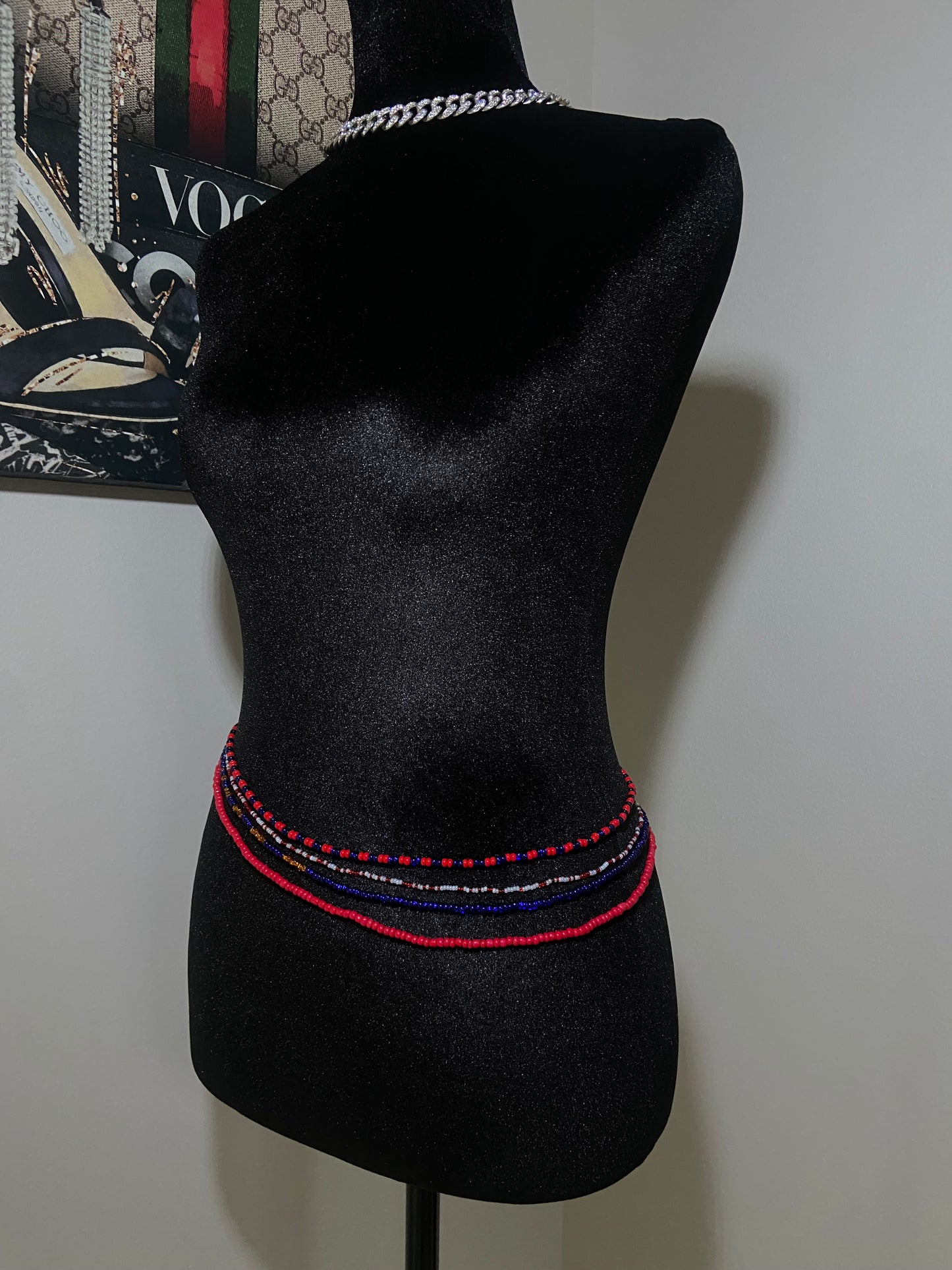 Haitian colors, red blue black waist beads on mannequin